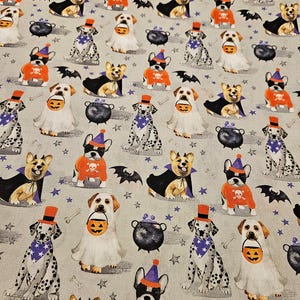 Halloween material, Dogs in costume on gray background, fabric is sold by the yard and is 100% cotton