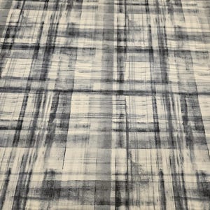 Blue and white faded plaid FLANNEL Fabric by the yard and is 100% cotton material and sold by the yard