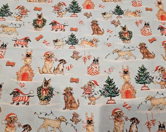Christmas dogs material is priced by the yard and is 100% cotton fabric