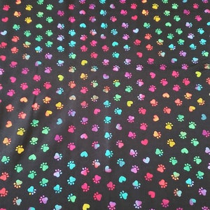 Rainbow dog prints and hearts on black background material by the yard 100% Cotton