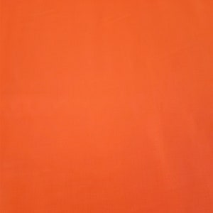 Tangerine Kona Cotton material by the yard