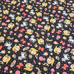 JoJo rainbow and unicorn material is sold by the yard and is 100% cotton fabric