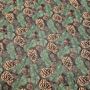 May include: A seamless fabric pattern featuring a repeating design of brown pine cones and green pine branches on a dark brown background.