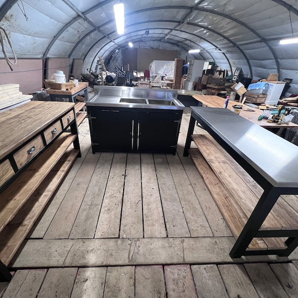 Stainless steel topped kitchen island and work benches