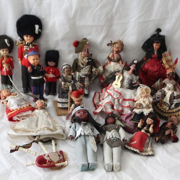 Vintage dolls set of 19 and bagpipe Flamenco dancer Queen's Guard King's guard Scottish bagpipe player Lacemaker Native American Indian doll