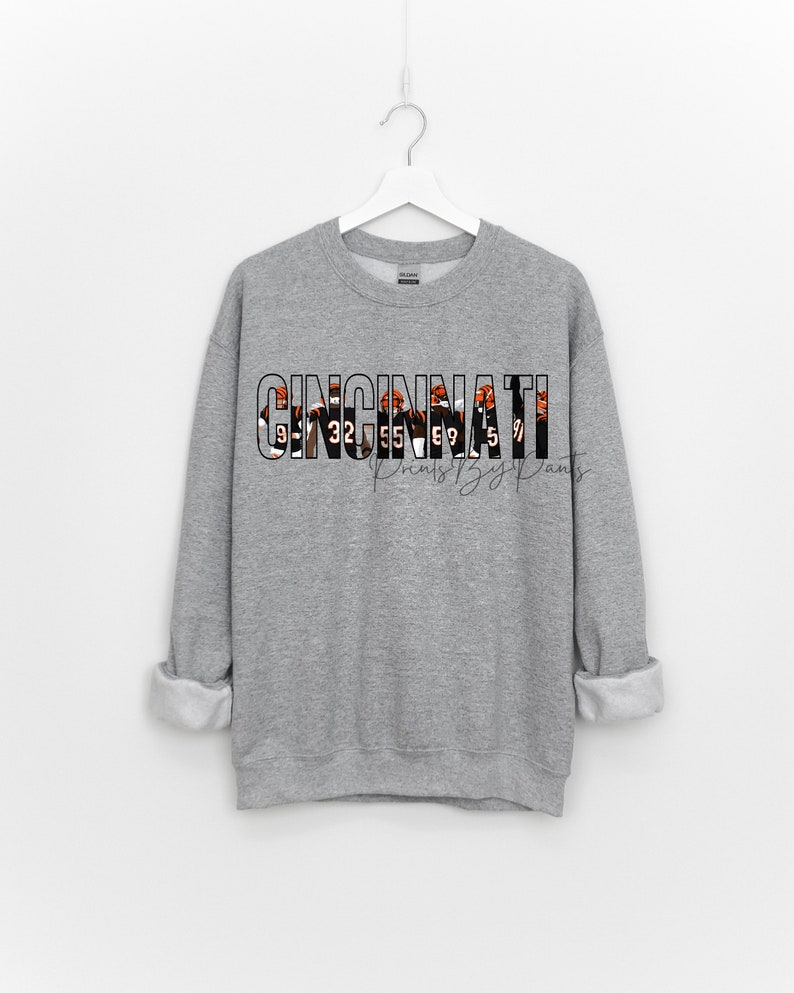 Digital Print transparent Cincinnati Bengals players filled in Football PNG Orange, black, and white image 1