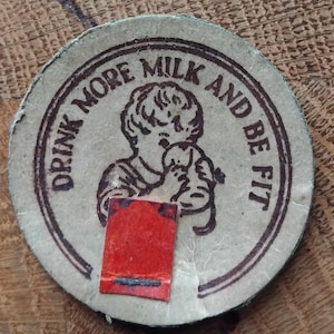 Vintage 1950 milk bottle top. Advertising.Pop art style.