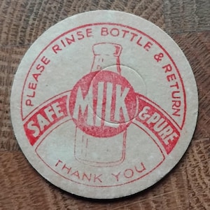 Vintage 1950 milk bottle top. Advertising.Pop art style.