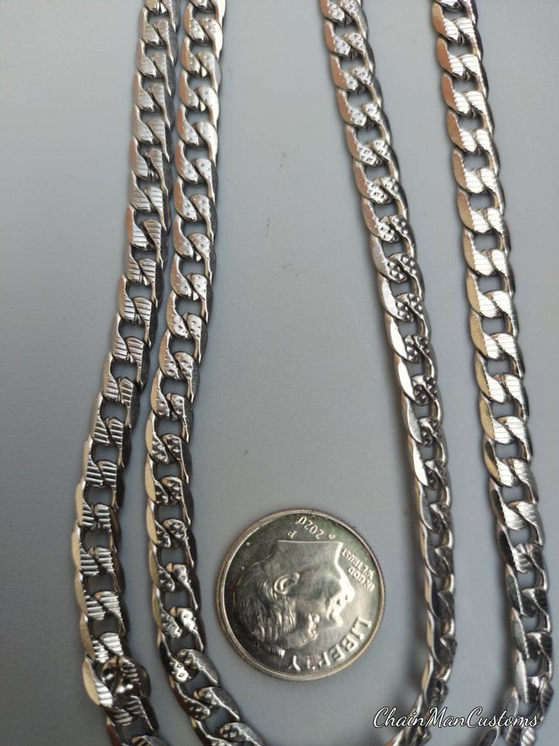 2 unique custom solid stainless steel tread chains