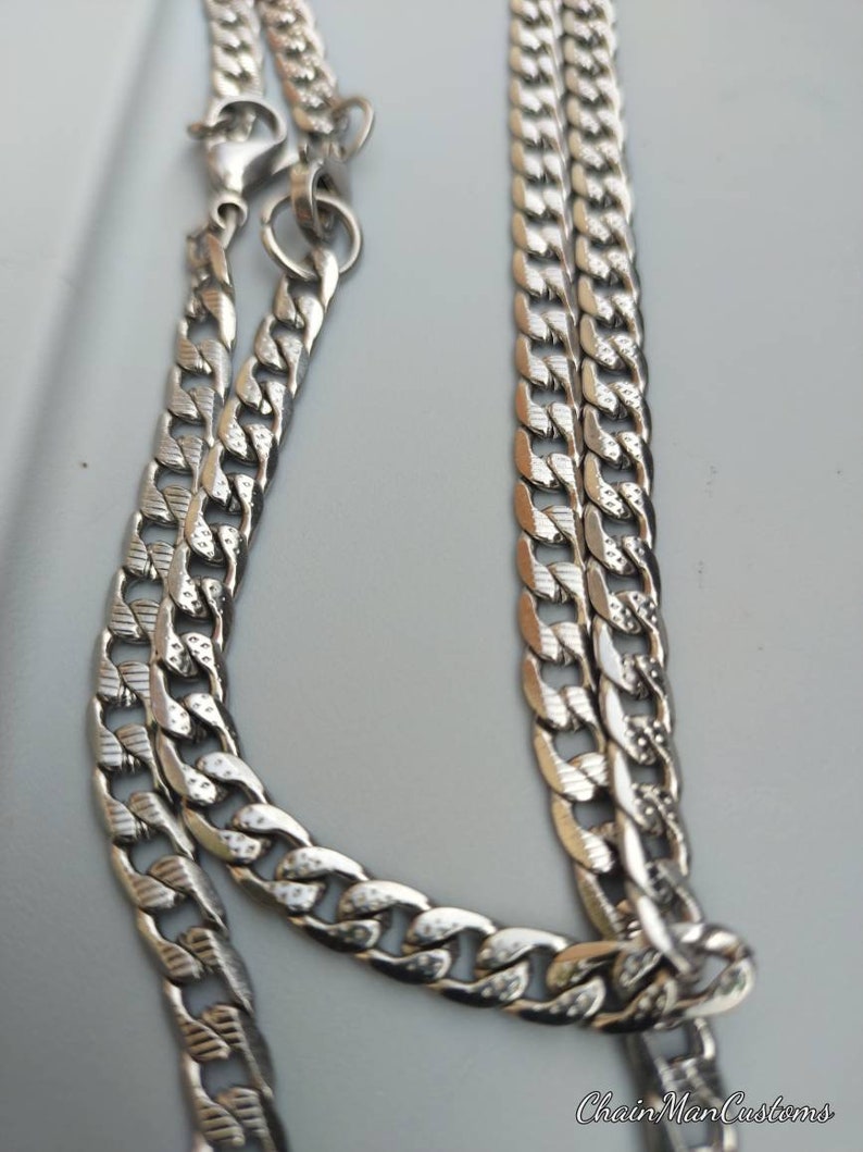 2 unique custom solid stainless steel tread chains