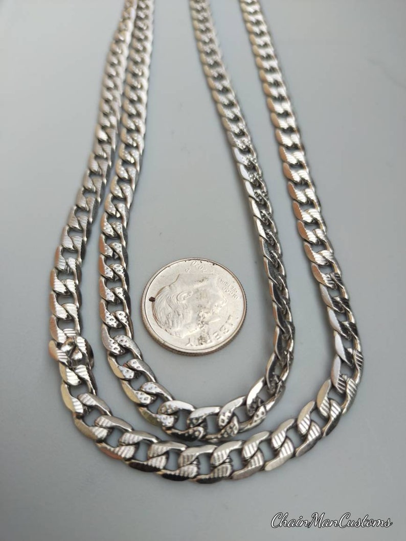 2 unique custom solid stainless steel tread chains