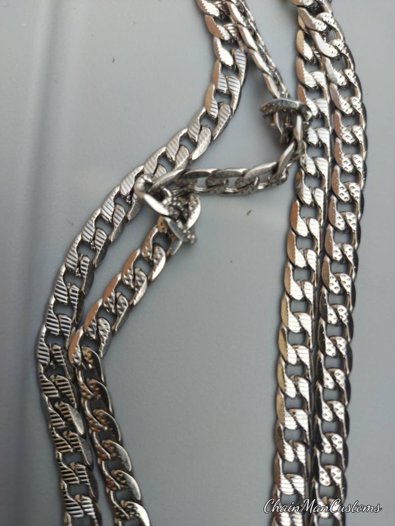 2 unique custom solid stainless steel tread chains