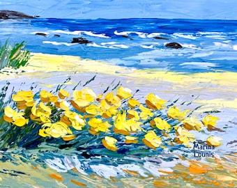 May include: A painting of a beach scene with yellow flowers in the foreground, blue water, and a rocky shore in the background. The artist's signature, "Marina Loumis", is in the bottom right corner.