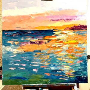 May include: Abstract painting of a seascape with a sunset sky in shades of pink, orange, and yellow. The water is painted in shades of blue, green, and white, with thick brushstrokes creating a textured effect.