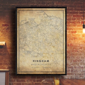 May include: A vintage-style map print of Hingham, Massachusetts. The map is in black and white and features a compass rose and the coordinates 42.2418°N, 70.8898°W.