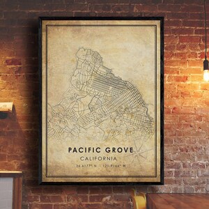 May include: A vintage style map print of Pacific Grove, California. The map shows the city streets and surrounding area. The coordinates 36.6177° N - 121.9166° W are printed below the city name.