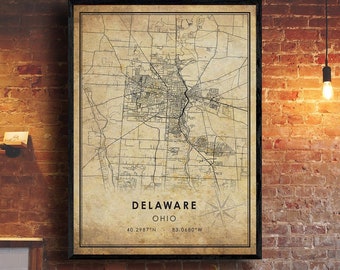 May include: A vintage style map print of Delaware, Ohio. The map is in black and white with a beige background. The text "DELAWARE OHIO 40.2987°N 83.0680°W" is at the bottom of the map.