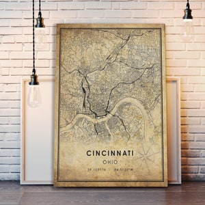 May include: Vintage style map print of Cincinnati, Ohio with the city's name and coordinates, 39.1031&deg; N - 84.5120&deg; W, printed on a beige background.
