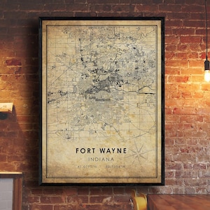 May include: Vintage style map print of Fort Wayne, Indiana with the city's coordinates: 41.0793°N, 85.1394°W. The map is printed on a beige background with black lines and text.