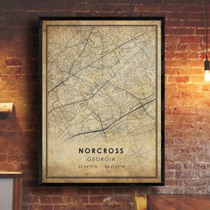 May include: A vintage-style map print of Norcross, Georgia. The map is in black and white and features a compass rose and the coordinates 33.9411°N 84.2137°W.