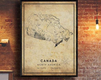 May include: A vintage-style map of Canada, printed on a beige background with black lines. The map shows the provinces and territories of Canada, as well as major cities and roads. The text "CANADA NORTH AMERICA 56.1304°N 106.3468°W" is printed below the map.