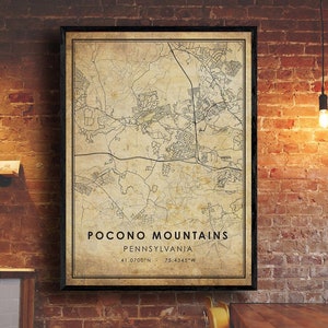 May include: A vintage-style map print of the Pocono Mountains in Pennsylvania. The map is in black and white and has a brown background. The text "Pocono Mountains Pennsylvania 41.0700°N 75.4345°W" is printed at the bottom of the map.