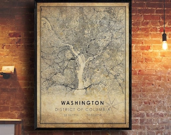 May include: A vintage-style map print of Washington, D.C., District of Columbia. The map is in black and white with a beige background. The text "WASHINGTON DISTRICT OF COLUMBIA 38.9072°N 77.0369°W" is at the bottom of the map.