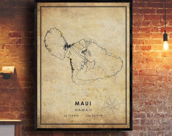 May include: A vintage-style map print of Maui, Hawaii. The map is in black and white and features the island's coastline and major roads. The text "MAUI HAWAII 20.7984°N - 156.3319°W" is printed at the bottom of the map.