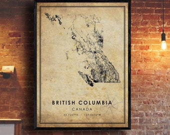 May include: A vintage-style map print of British Columbia, Canada. The map is in black and white and shows the province's roads and rivers. The map is on a beige background with a black frame. The text "British Columbia, Canada" is printed below the map, along with the coordinates "53.7267°N, 127.6476°W".