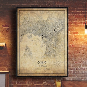 May include: A vintage-style map print of Oslo, Norway. The map is in black and white and shows the city's streets and landmarks. The text "Oslo, Norway" and the coordinates "59.9139°N - 10.7522°E" are printed at the bottom of the map.