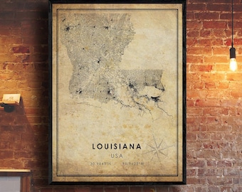 May include: A vintage-style map of Louisiana, USA, with a compass rose and coordinates. The map is printed on a beige background with black lines and text. The map is framed in a black frame.