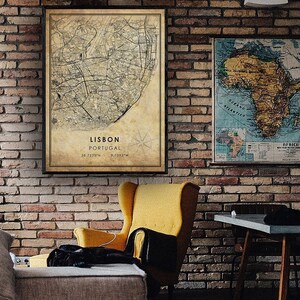 May include: A vintage-style map of Lisbon, Portugal, with a compass rose and the coordinates 38.7223&deg;N, 9.1393&deg;W. The map is printed on aged paper with a brown background and black lines.