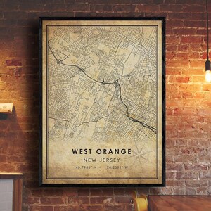 May include: A vintage-style map print of West Orange, New Jersey, with a black frame. The map shows the streets and roads of the city. The text "West Orange, New Jersey" and the coordinates "40.7986° N, 74.2391° W" are printed at the bottom of the map.