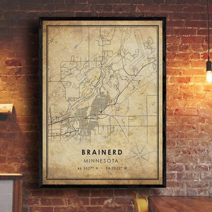 May include: A vintage-style map print of Brainerd, Minnesota. The map is in black and white and features a compass rose and the coordinates 46.3527° N - 94.2020° W.