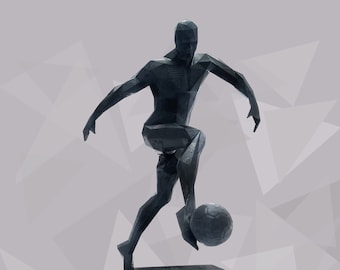 Figura geométrica de jugador de fútbol: escultura deportiva de fútbol pintada a mano