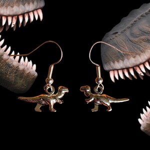 Pendientes de dinosaurio