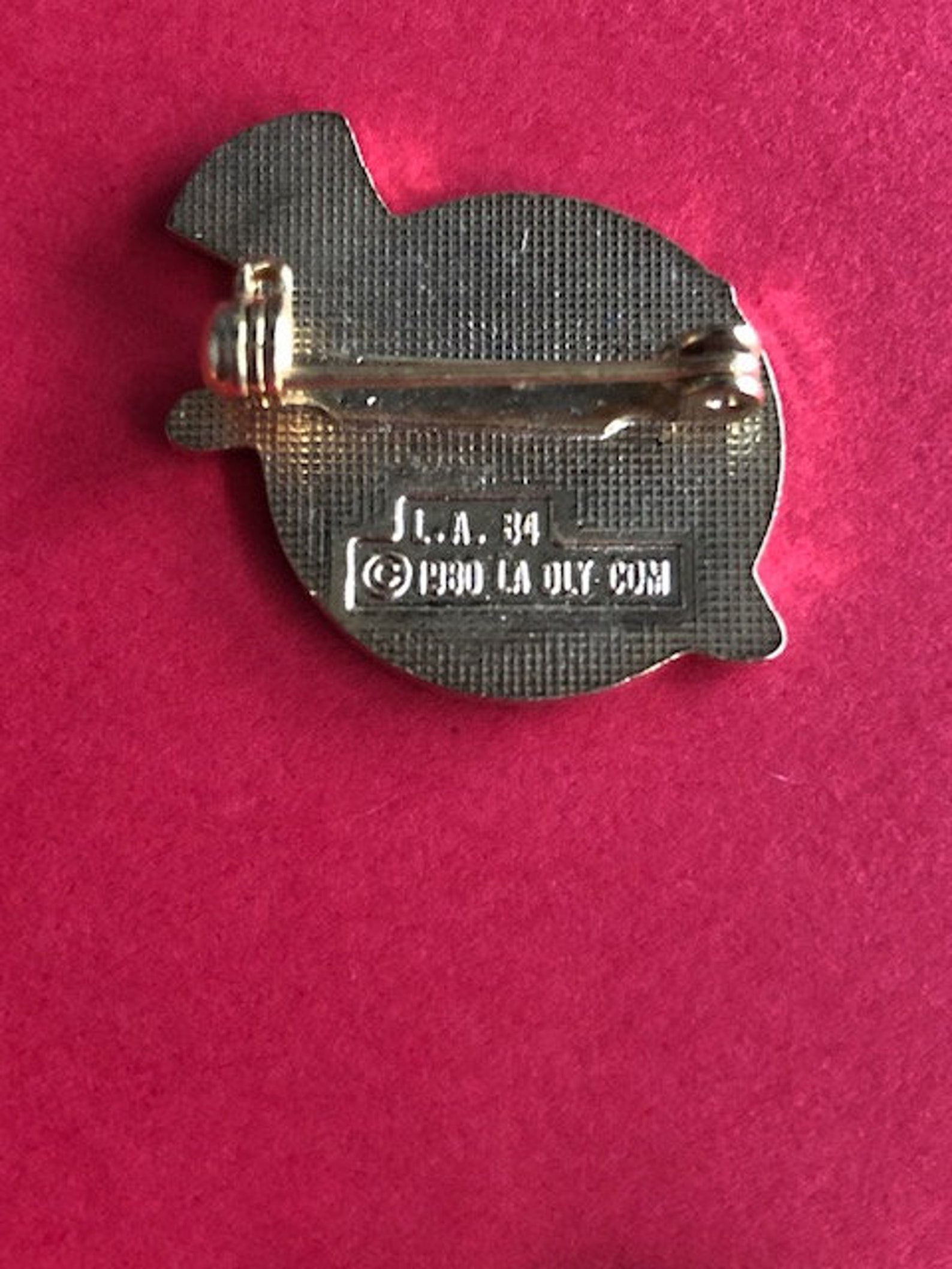 Pin's Olympique Los Angeles 1984 – Sam L'Aigle, Athlétisme Haies (Édition Vintage)