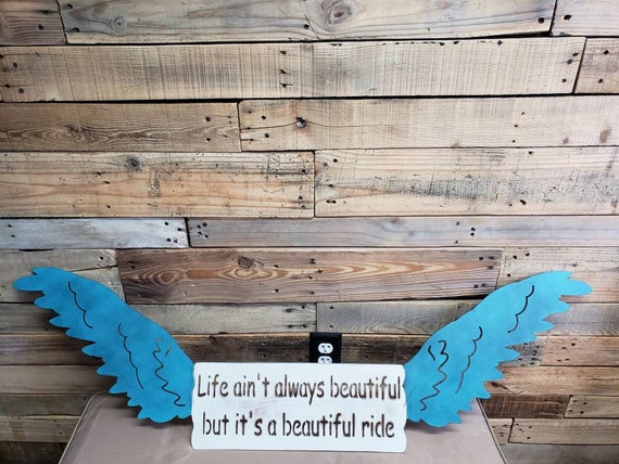 Beautiful Rustic Angel Wing metal sign "Life Ain't Always Beautiful But It's A Beautiful Ride"