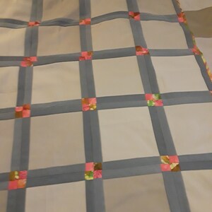 khaki jeans scrappy unfinished quilt top. denim