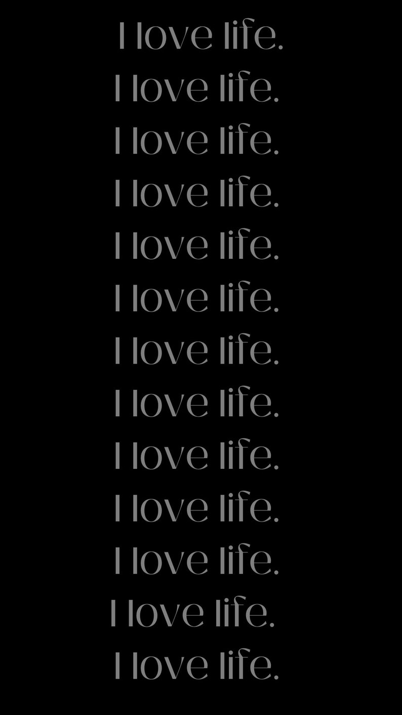 May include: A black and white image with the text "I love life." repeated 13 times.
