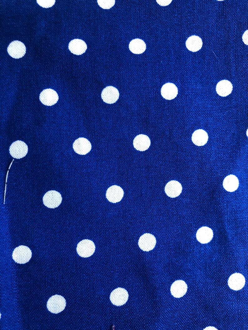 Blue polka dot scrunchie