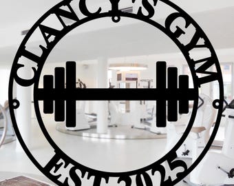 May include: Black metal sign with the text "Clancy's Gym Est 2025" in a circle with a dumbbell in the center.