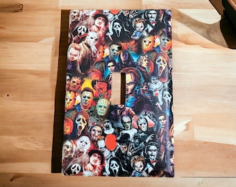May include: A light switch cover featuring a collage of horror movie characters, including Freddy Krueger, Jason Voorhees, and Michael Myers. The cover is made of durable plastic and is easy to install.