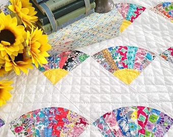 Cheerful vintage generational yellow and white fan quilt