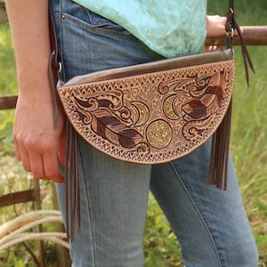 Mini women&#39;s bag in bronze leather, fringes, moon, stars and feathers