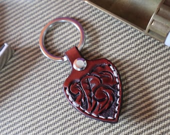 Leather pick keychain for mahogany guitarists