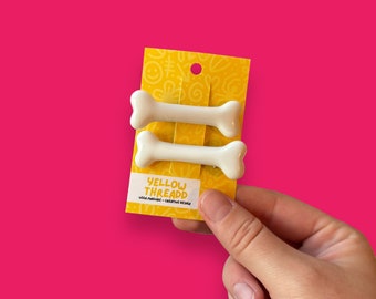 Pinzas para el pelo con forma de hueso (paquete de 2)