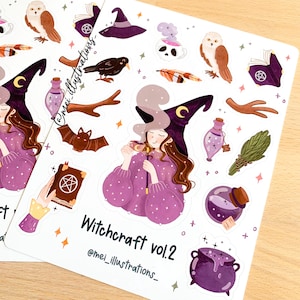 May include: Sheets of stickers featuring witch-themed illustrations. Designs include a witch with a purple hat, a cauldron, potion bottles, an owl, a raven, and the text "Witchcraft vol.2". The stickers have a white background.