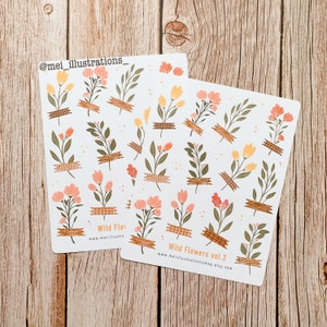 May include: Two sticker sheets featuring floral designs with orange, peach, and green flowers, accented with brown tape. The text "Wild Flowers vol. 3" and a website address are printed on the stickers. The artist's Instagram handle is also visible.