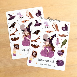 May include: Two sticker sheets featuring illustrations of witch-themed elements. Each sheet includes a witch with a crescent moon hat, a crow, a bat, a spell book, and other mystical items. The text "Witchcraft vol.2" is visible.
